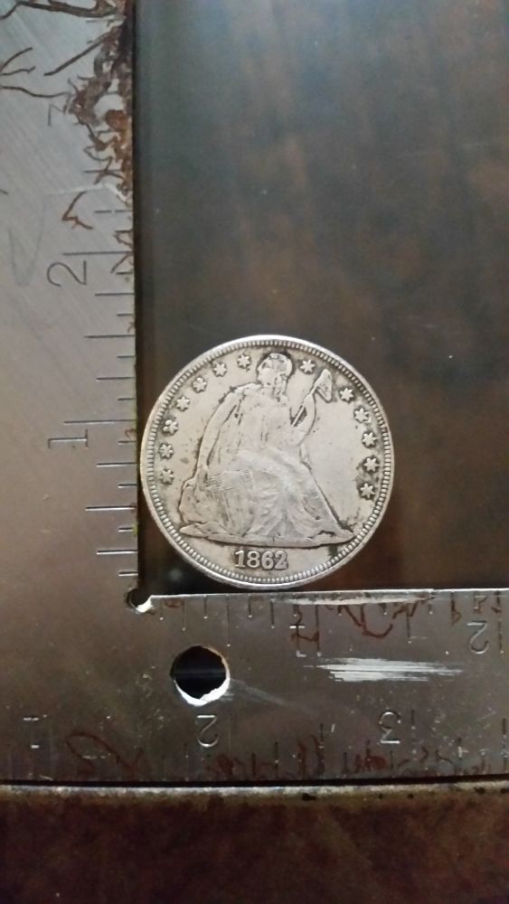 1862-Seated-Liberty-Silver-Dollar